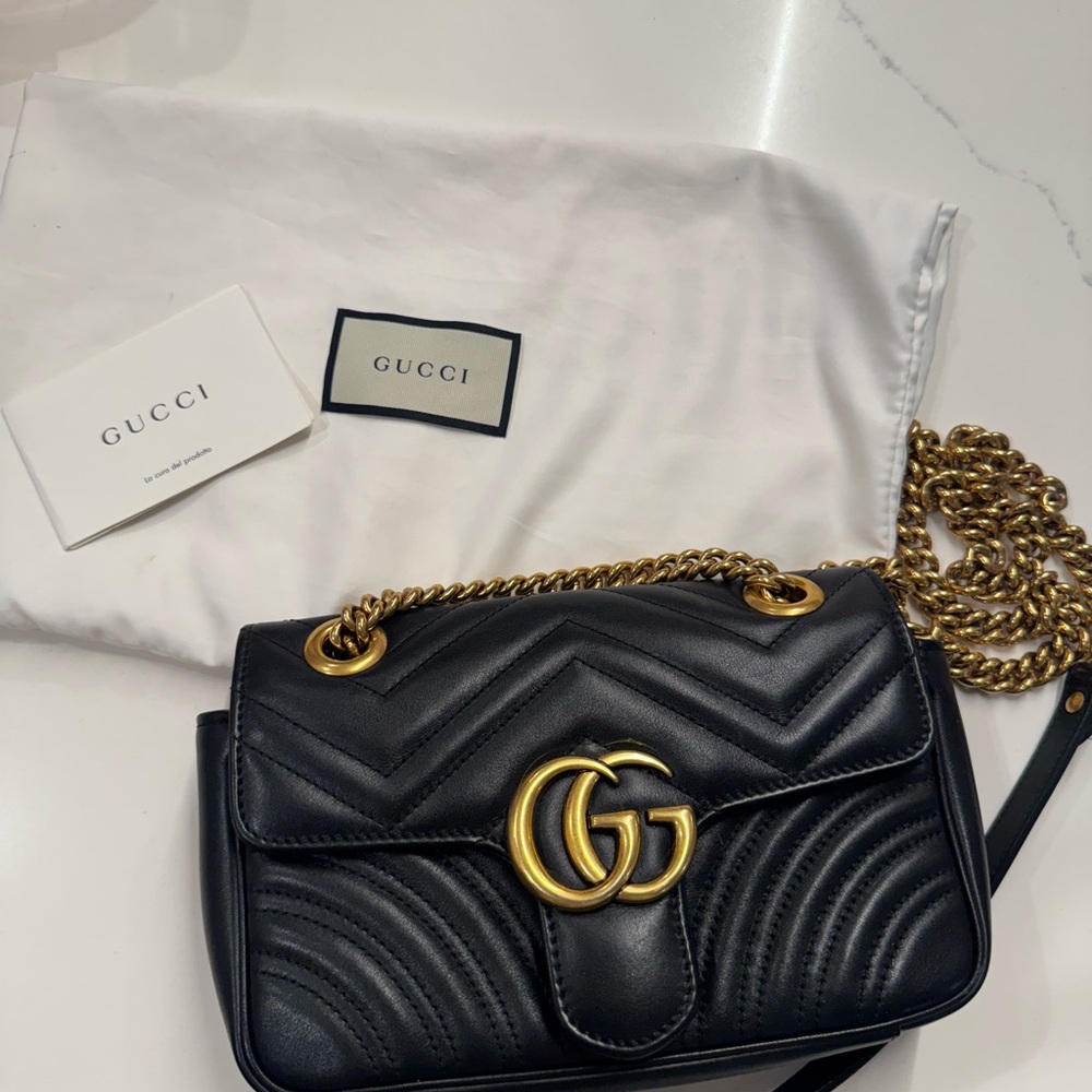 Gucci Black and Gold Shoulder Bag with Quilted Leather and Chain Strap